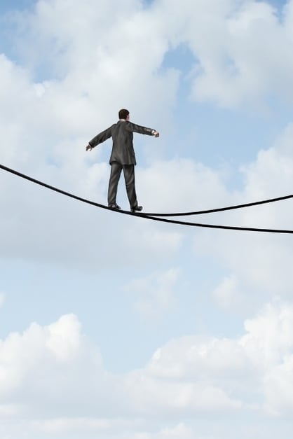 Man on tightrope