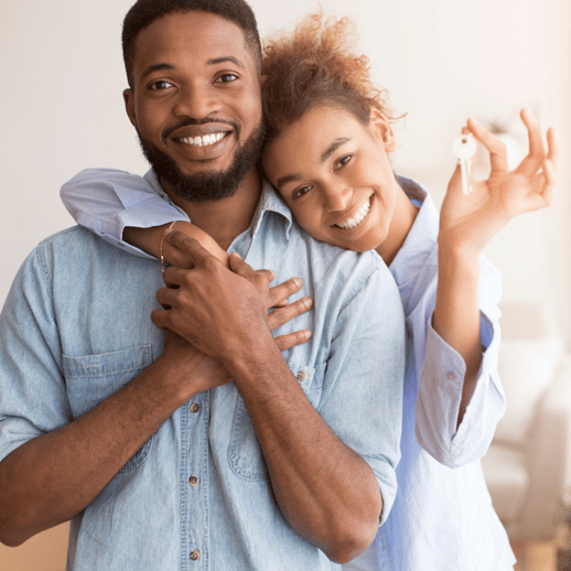 Couple holding key